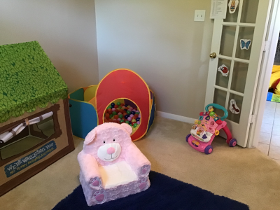 Image of a ballpit and bear chair